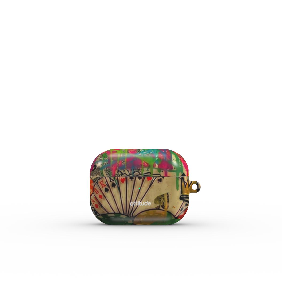 A small rectangular product with rounded corners, shown alone on a light gray background. The item has a colorful abstract and fan-like printed design in pink, green, beige, black, and gold tones, with a small metallic ring on the right side.